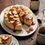 Delia Smith banoffee cheesecake with banana slices and toffee pecan sauce