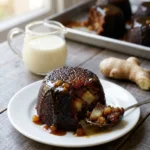 Delia Smith sticky gingerbread pudding served with ginger wine sauce and cream