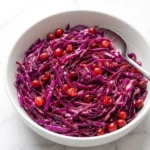 Delia Smith spiced red cabbage with cranberries served in bowl