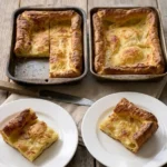 Delia Smith Yorkshire pudding for 12 golden and risen in two rectangular tins