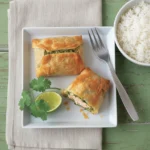 Baked Thai salmon filo parcels with herb paste and salmon inside served with jasmine rice